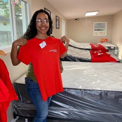 Customer in mattress store in Pensacola, Fl